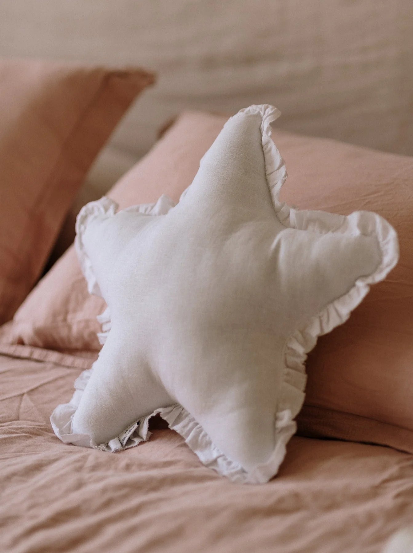 cojìn estrella blanco lino